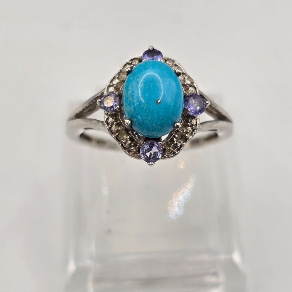 Vintage Oval Cabochon Sleeping Beauty, Tanzanite, and White Sapphire Silver Ring